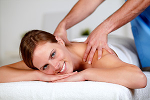 Beautiful young woman getting a massage